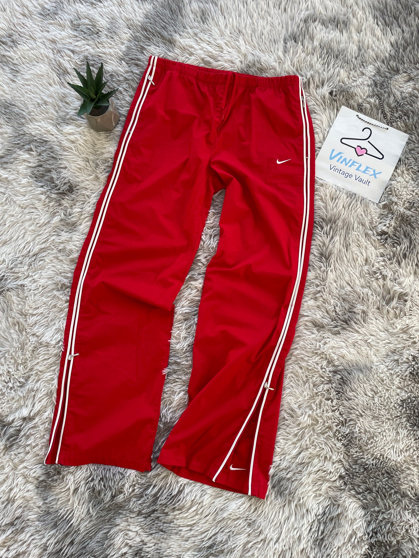 Nike Flared Trackpants (M Frauen)