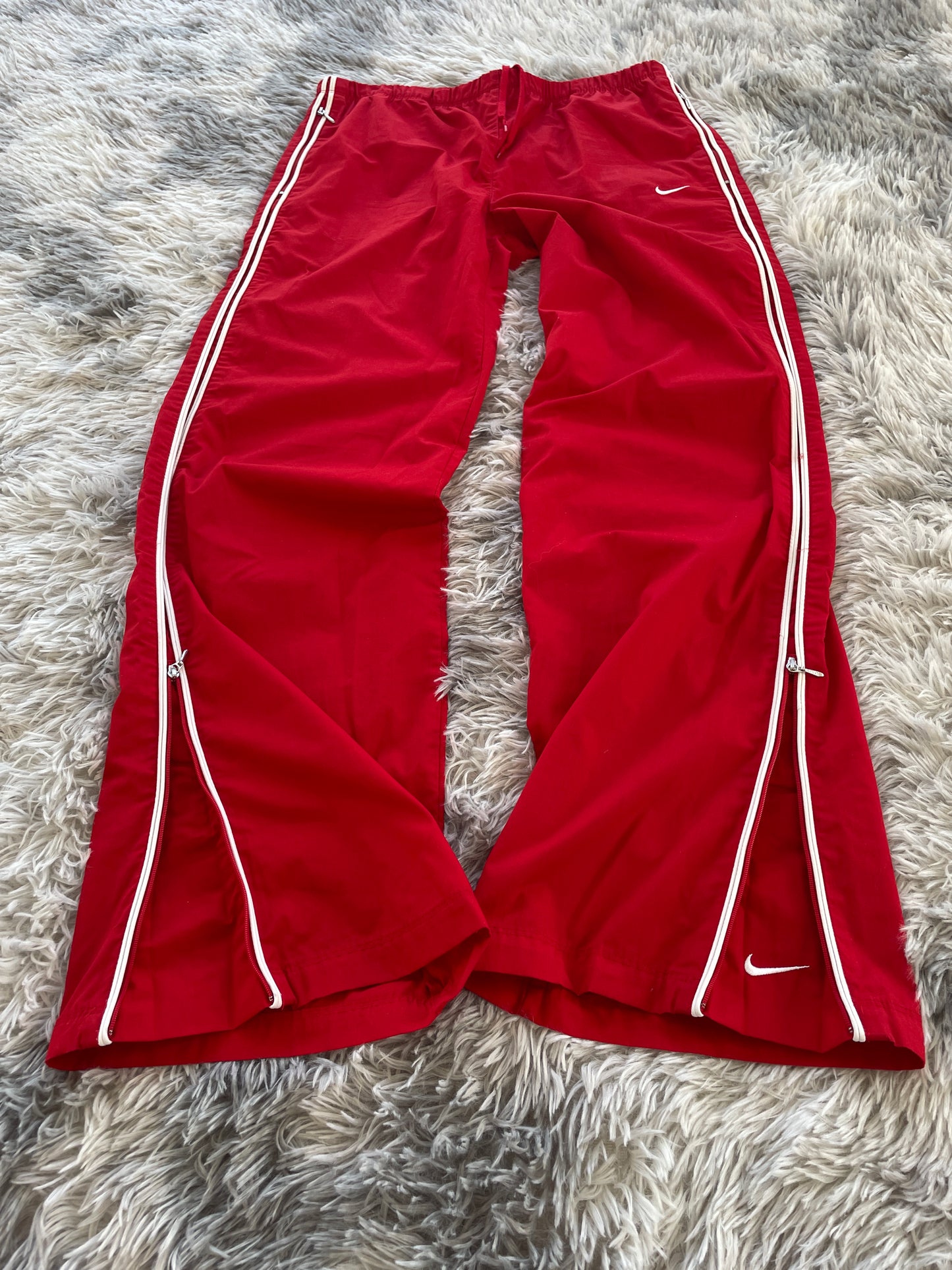 Nike Flared Trackpants (M Frauen)