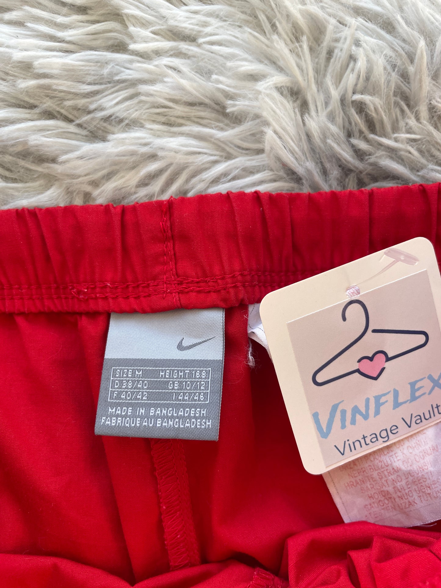 Nike Flared Trackpants (M Frauen)